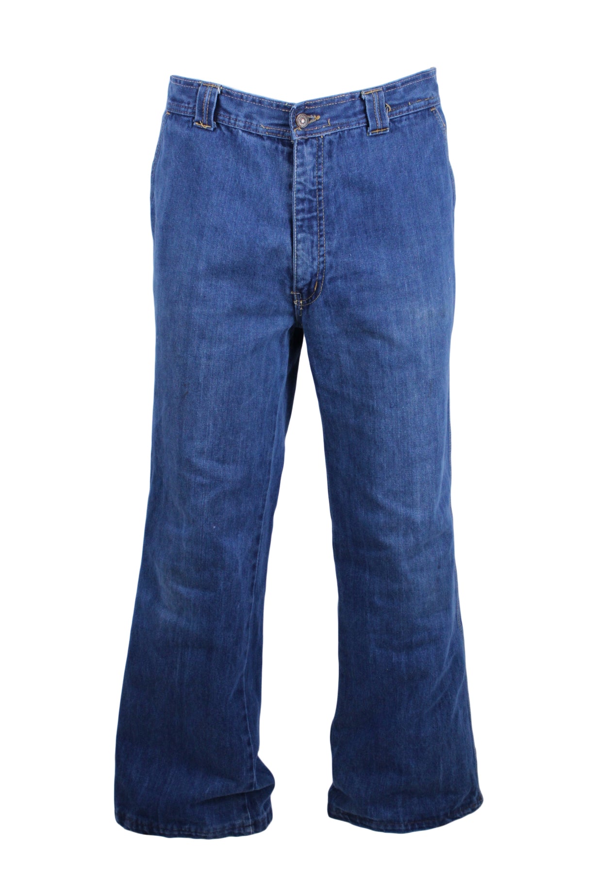 front view of unlabeled blue gender neutral denim jeans. features side hand pockets, rear patch pockets with stitch accents, and zip fly with button closure.