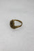 above angle of ring with abstract shape. 