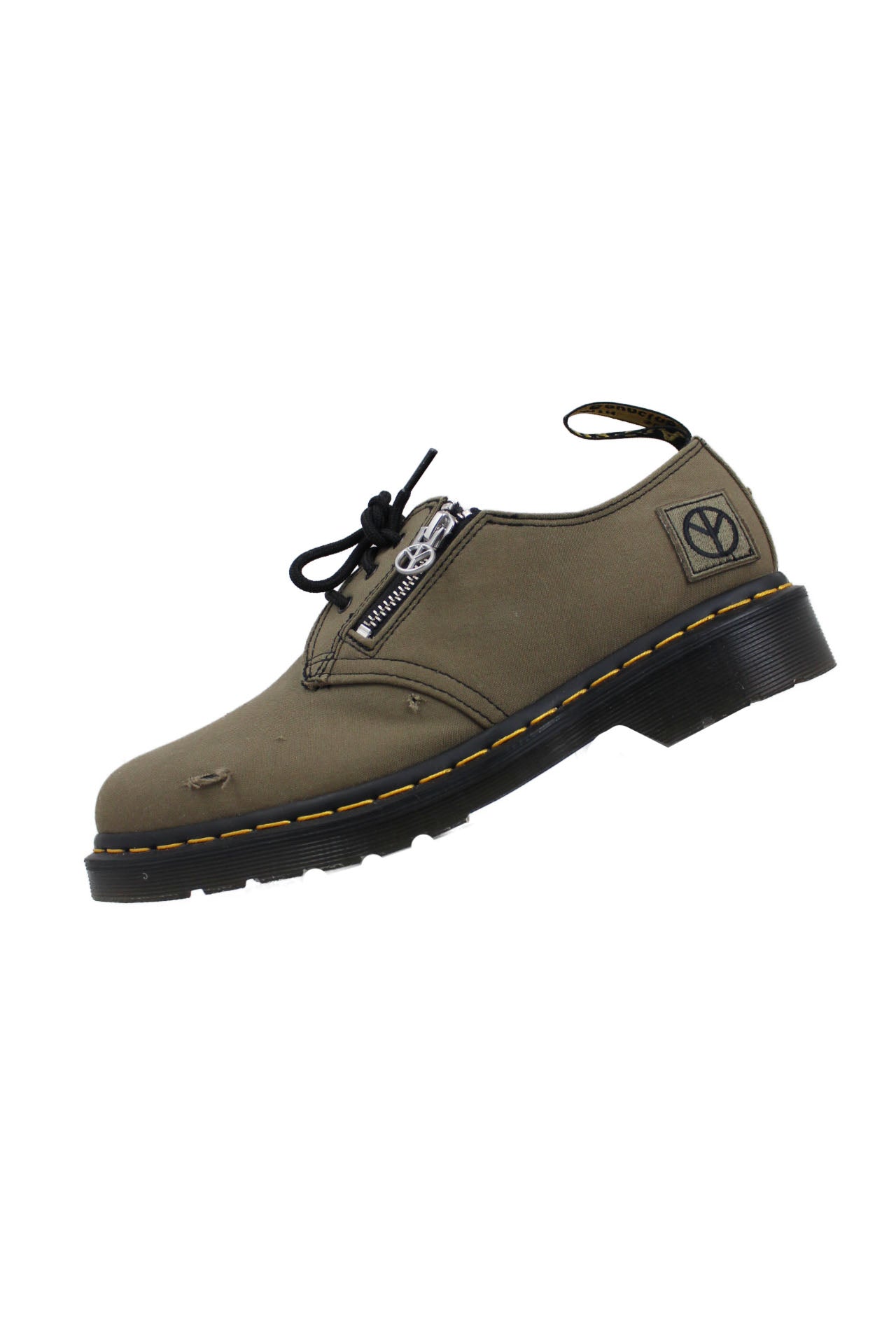 description: dr. martens dark green babylon canvas leather shoes. features exterior zip with babylon la puller, chaos sole pad print, tear-way fabric and rounded toe silhouette. 