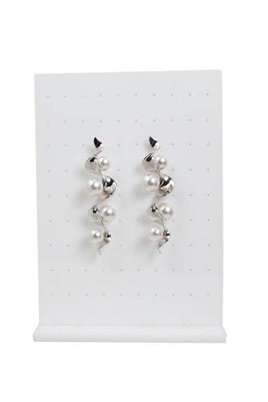description: unlabeled silver tone-metal swirl earrings. features stud closure, swirl silhouette, and pearl charm throughout. 