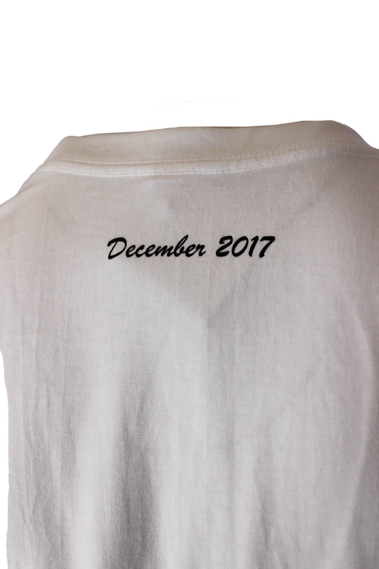 "december 2017" type print at back
