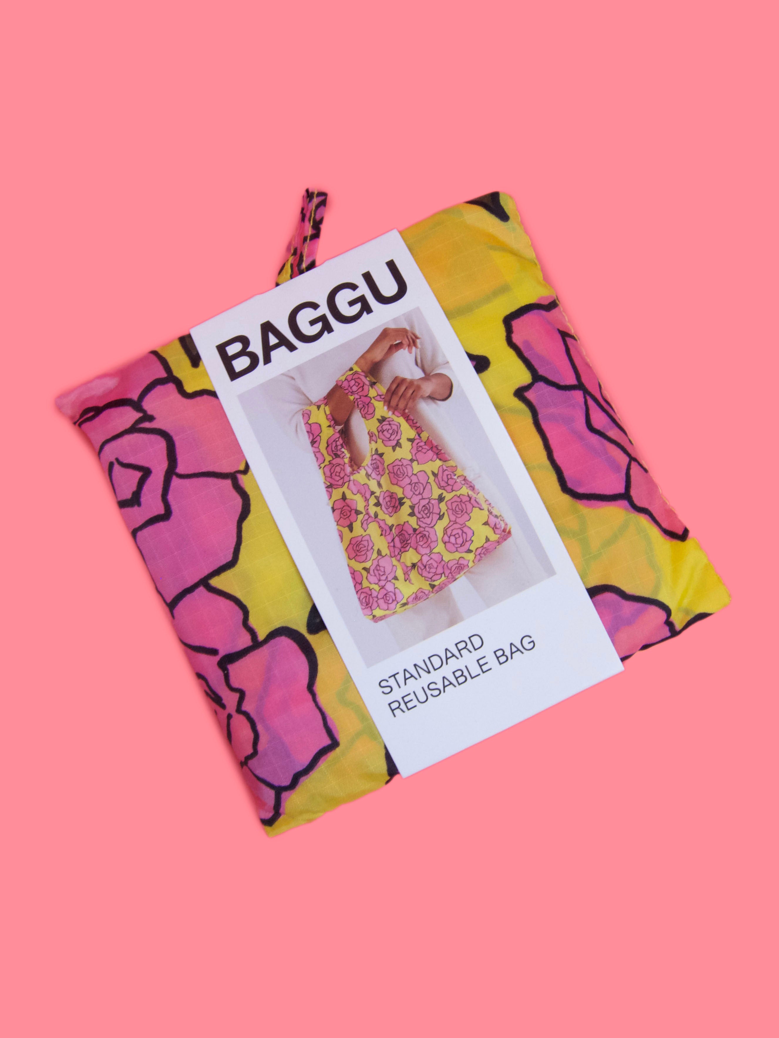 product shot of folded baggu rose print tote bag