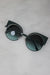 fendi "hypnoshine" green metal sunglasses. features circular blue gradient tinted lenses with metal cat eye silhouette, light blue color-blocked fluid accents that go across the lens