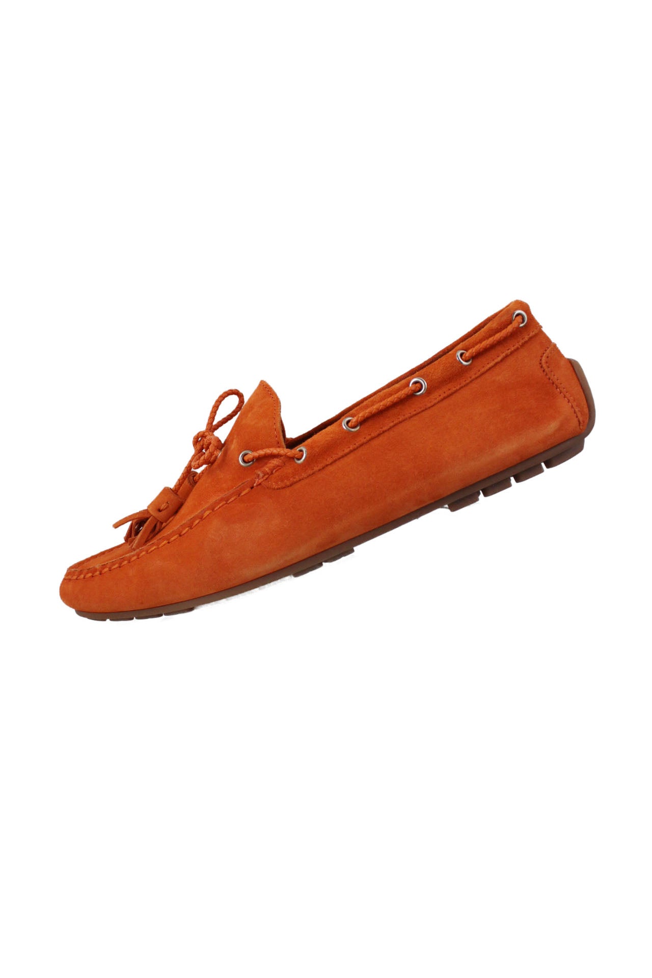 side view of ralph lauren orange suede loafers. features braided lace closure with tassels with rubber sole.