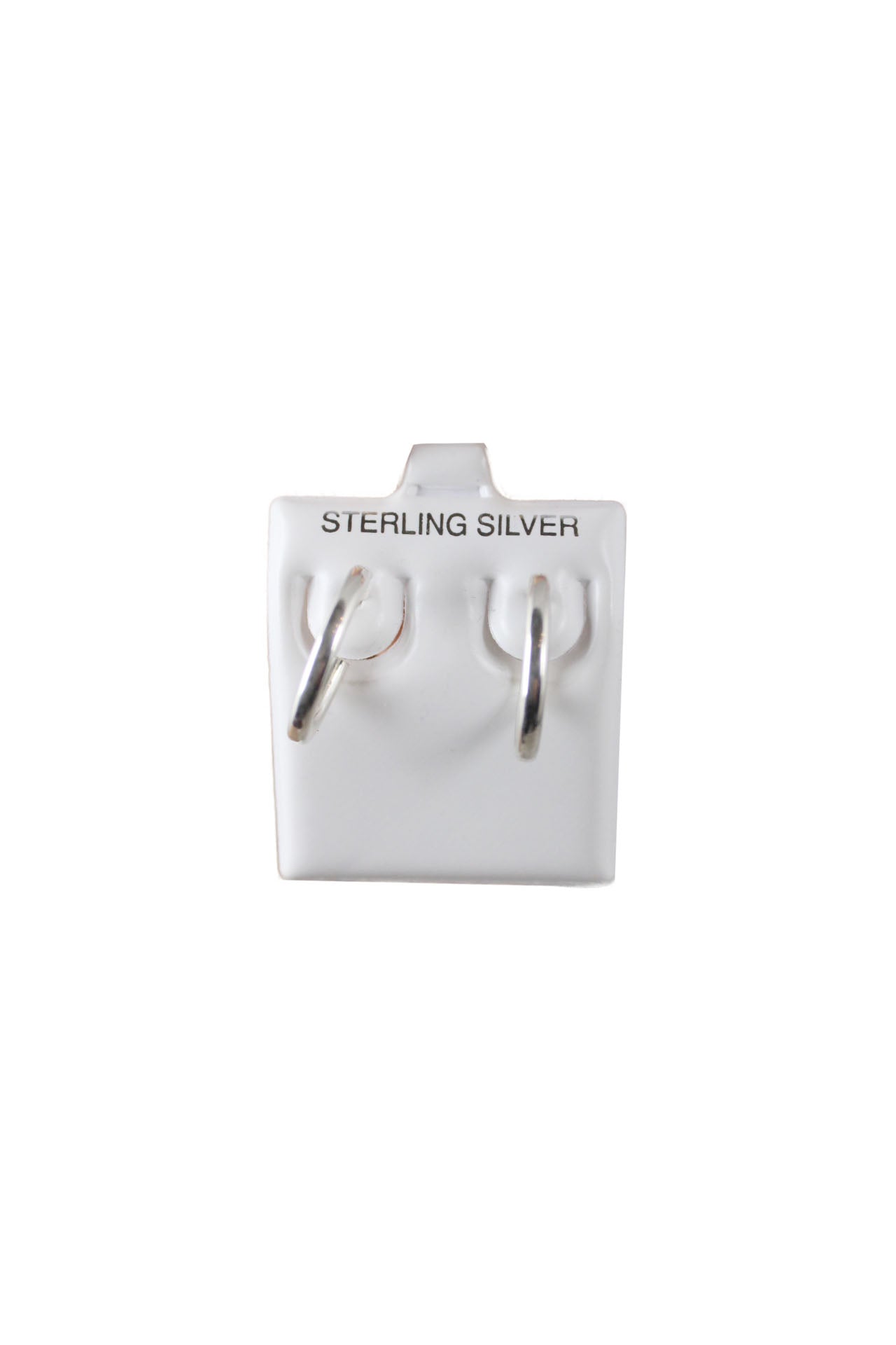 description: unlabeled sterling silver hoop earrings. features huggie closure.
