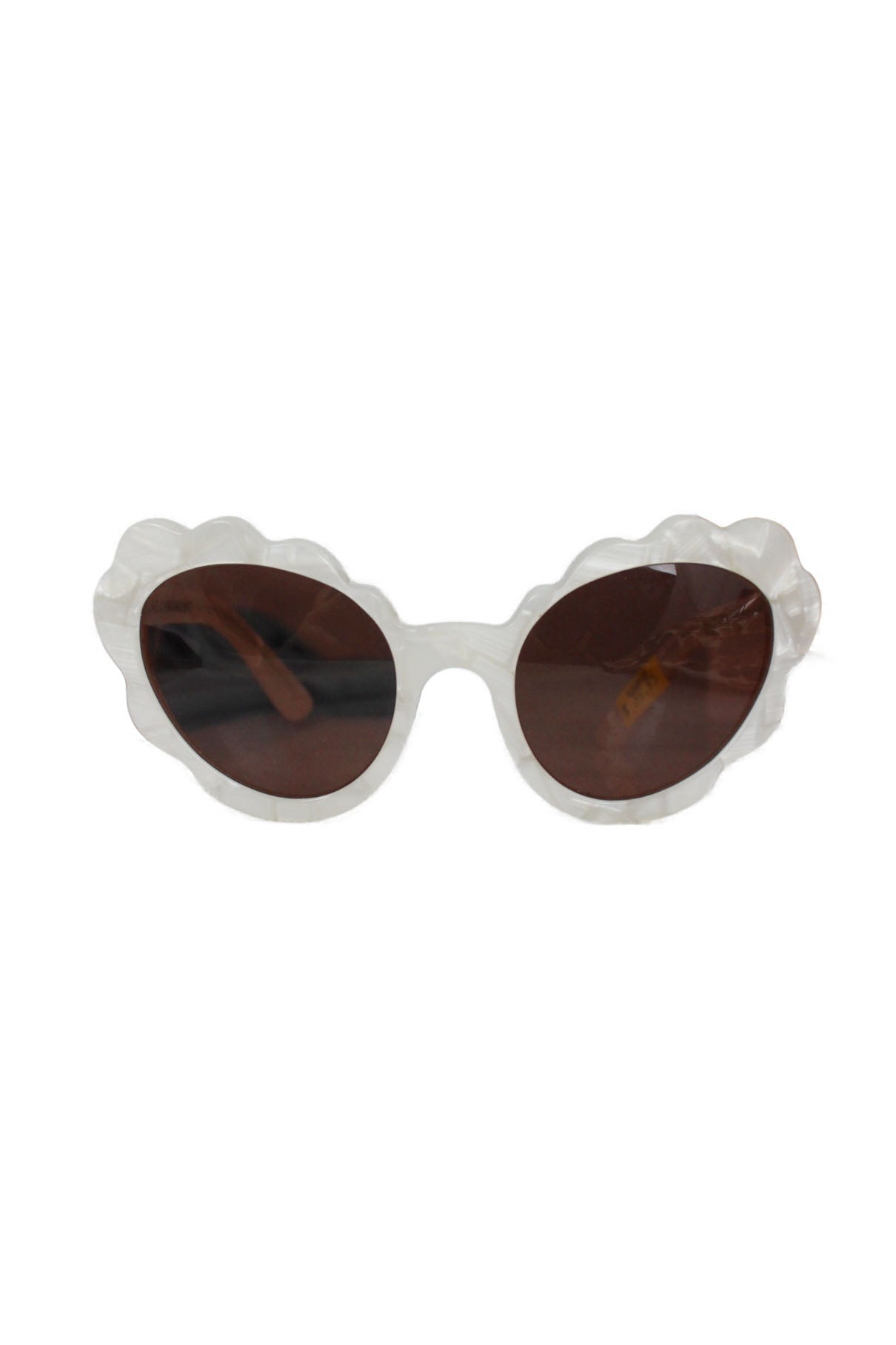 opening ceremony white sunglasses. features scalloped trim, cat eye silhouette, dark orange tint, and white marbled acrylic texture. 