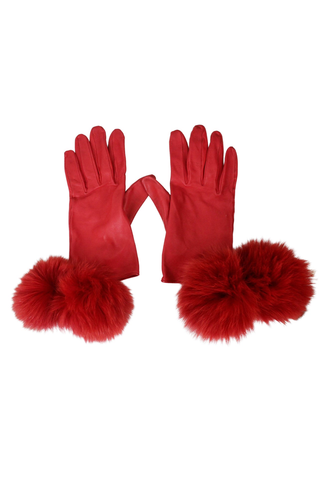 front of vintage red pompom gloves. features tonal stitching, and double pompom detail. 