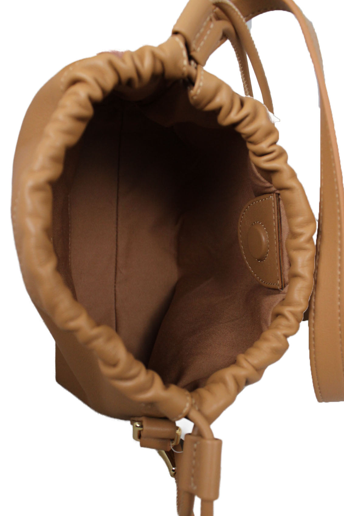 inside view of apc ninon mini brown drawstring shoulder bag. features small drawstring bag in nut brown recycled leather-like material. grained tan faux-leather, gold tone logo stamp at face, drawstring at throat, magnetic closure, patch pocket at interior, and twill lining