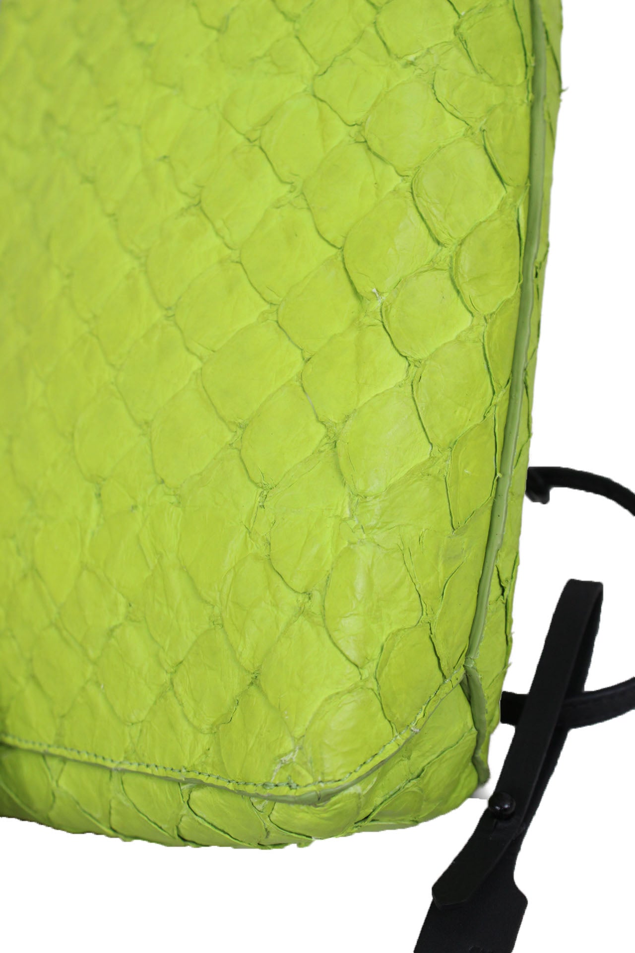 osklen pirarucu acid green box bag. features external textured fish leather, rectangular box shape, black metal hardware, two flaps with magnetic closures.