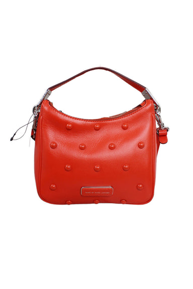 marc by marc jacobs sample orange cross body bag. features orange studs and triangular side panel, handbag strap and longer strap. 