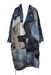 front of natsuko blue patchwork denim maxi coat. features v-neckline, patchwork design throughout, and snap button closure at center; oversized fit. 