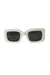 front of raen white sunglasses. features dark green lenses, and rectangular shape. 