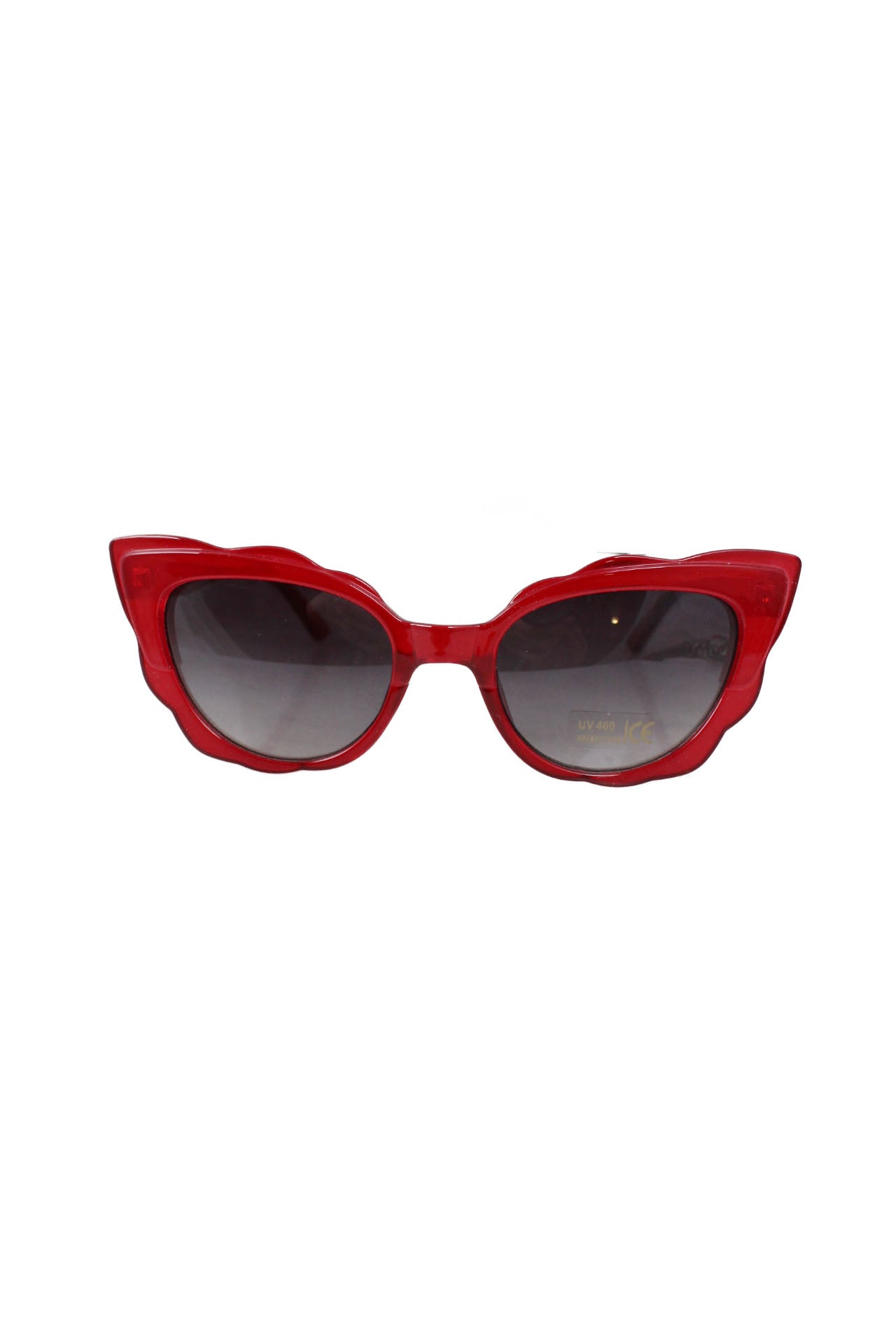 front of unlabeled red clear cat eye sunglasses. features gradient black lenses, and scalloped edges.