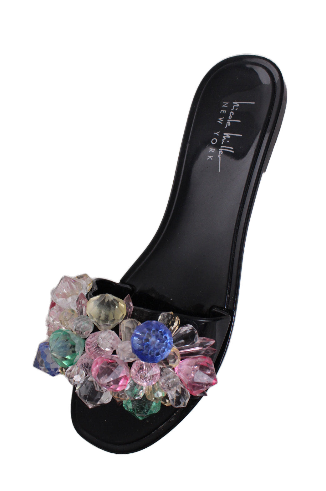 above three-quarter angle nicole miller black sandals featuring bead embellishment and squared toe.