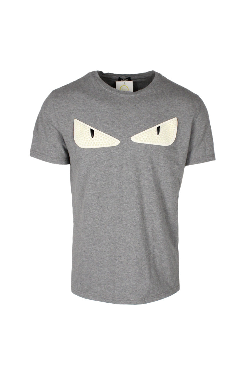 front view of fendi grey cotton t-shirt. features studded leather eye patches at chest with ribbed collar.