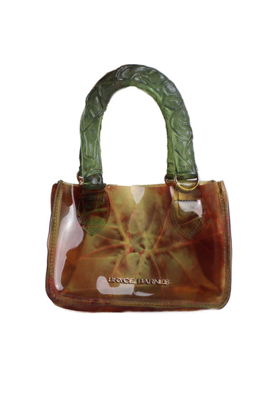  bryce barnes brown and green translucent plastic tiny handbag. features veiny clear handles, close up leaf print on body, gold toned hardware, and branding on one side. 