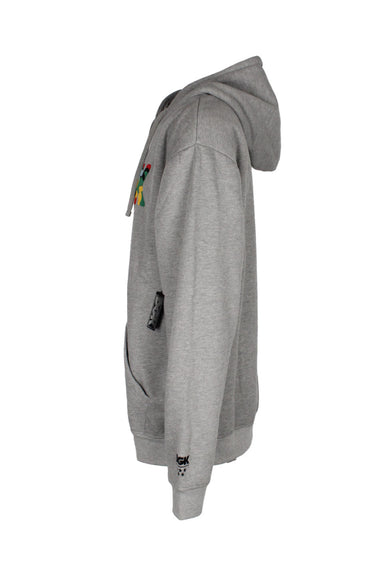 profile view with 'dgk' logo embroidered above left cuff of hoodie.