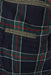 detail view of plaid lining and multi pockets of jacket.