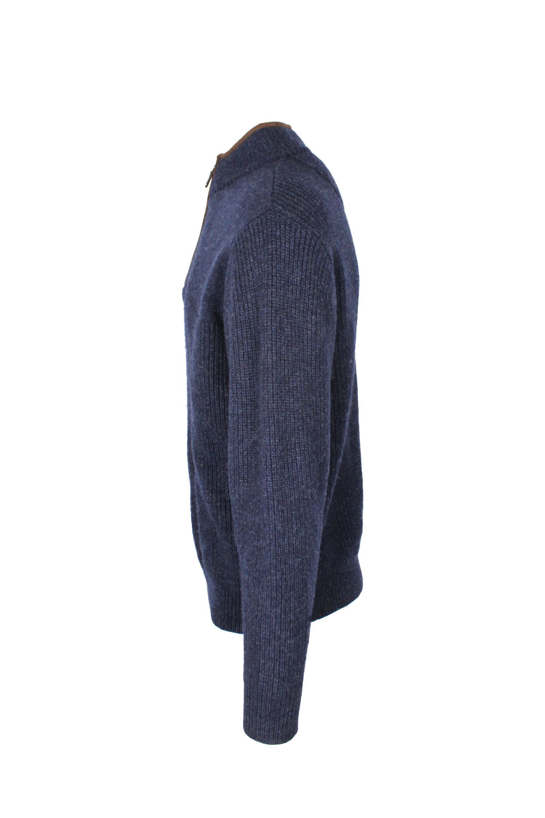 profile view with left sleeve of sweater.