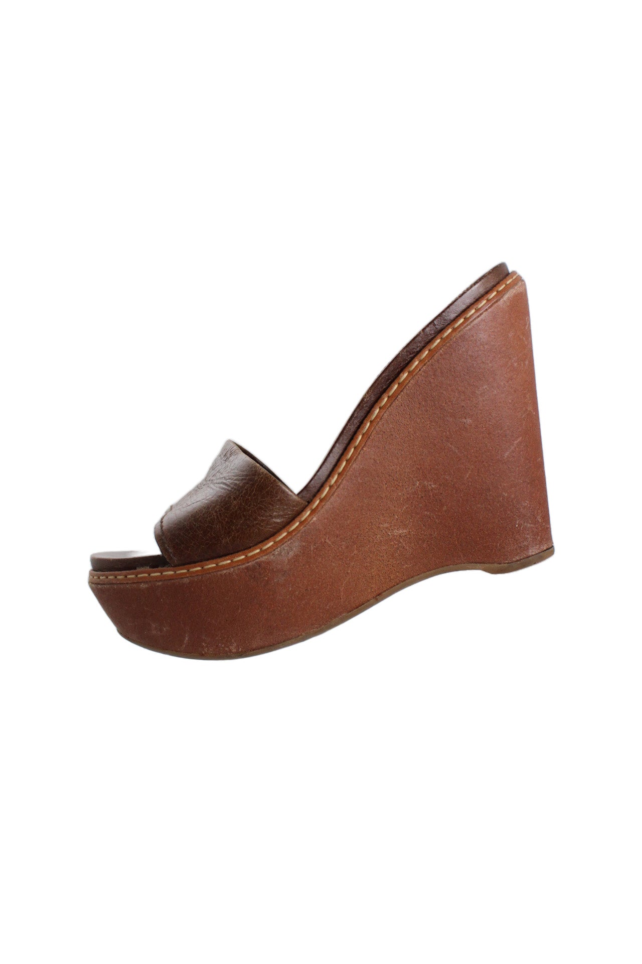 prada brown leather platform wedges. features single strap in dark brown leather, branded insole, lighter brown leather wedge, and visible stitching. 