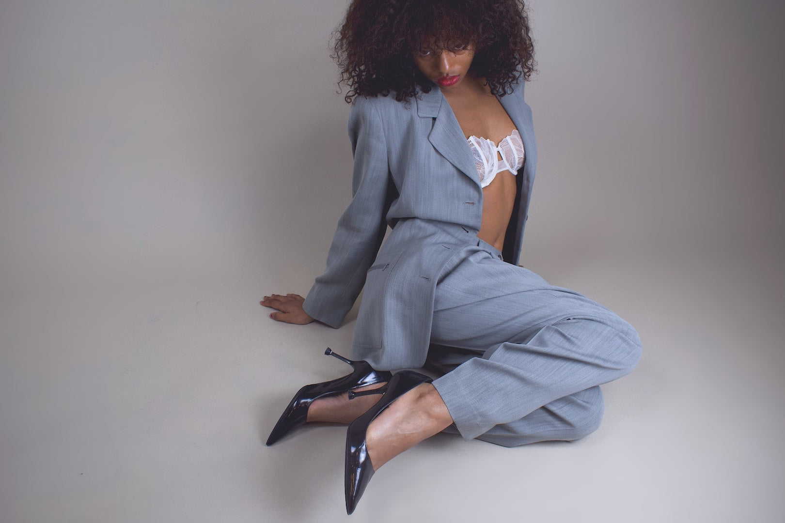model posing in suit in studio