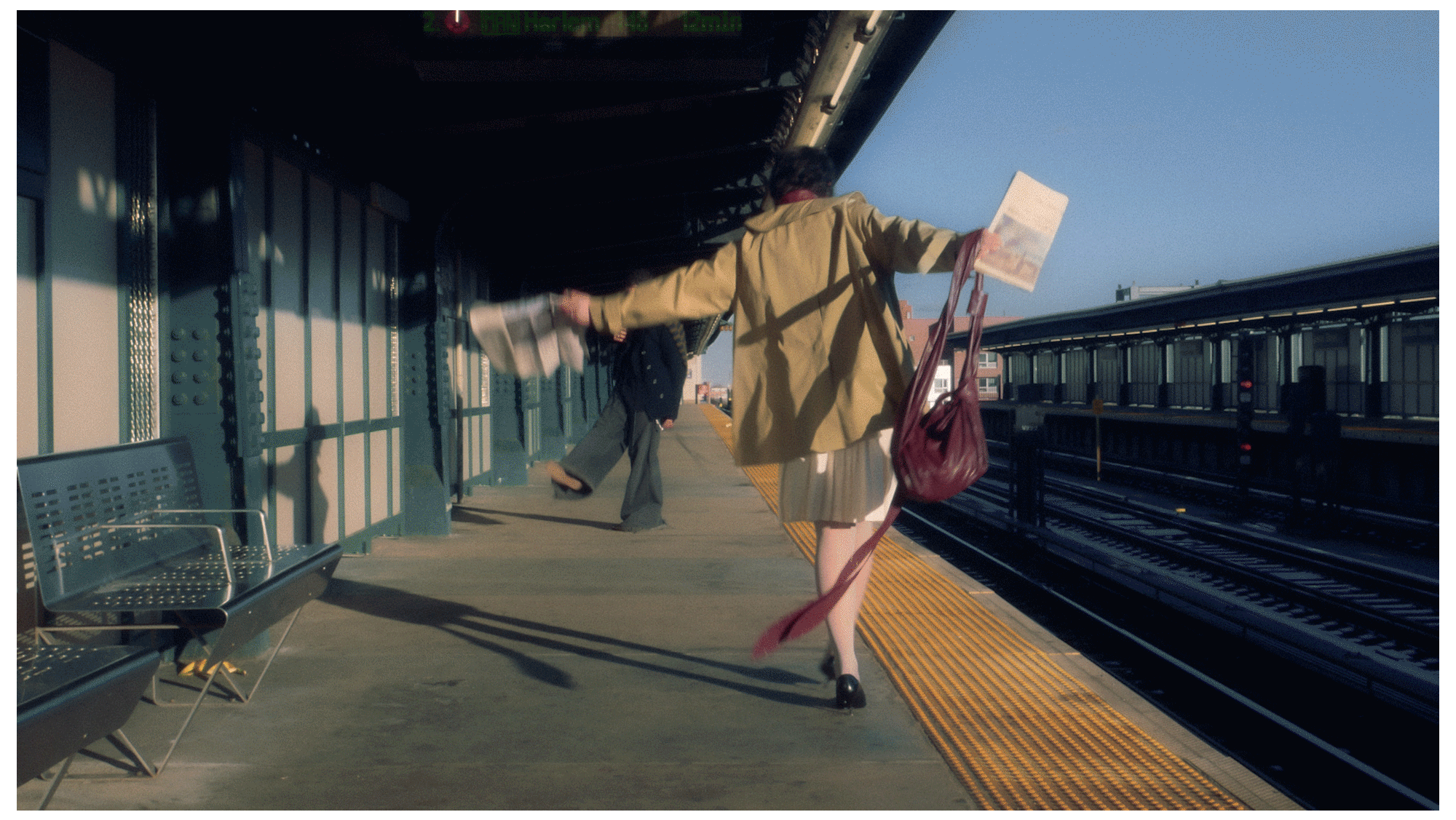 animated gif of editorial images of model with newspaper on subway platform and photographer with video camera