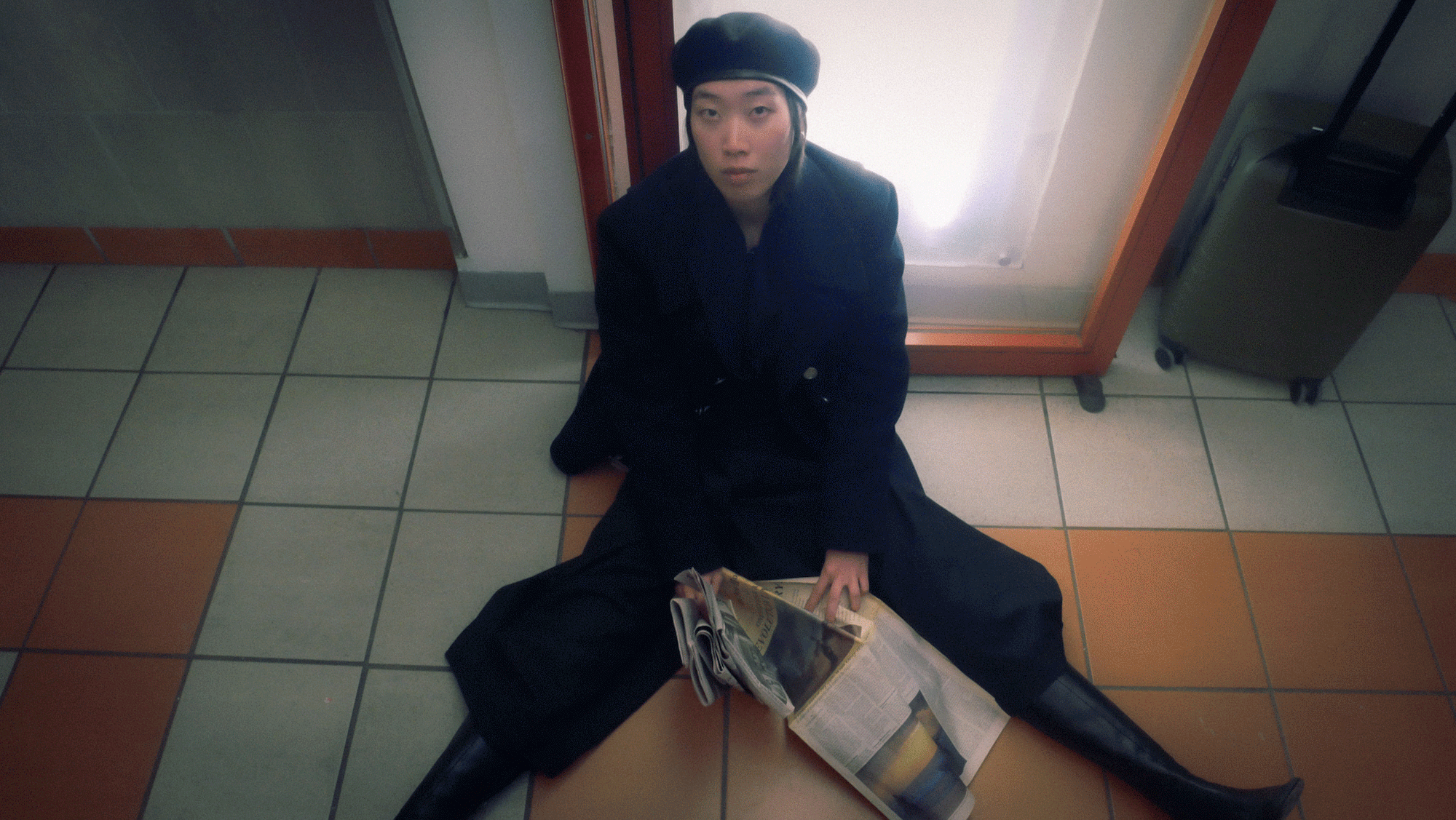 animated gif of slideshow of editorial images models posing in abstract fashion in subway station