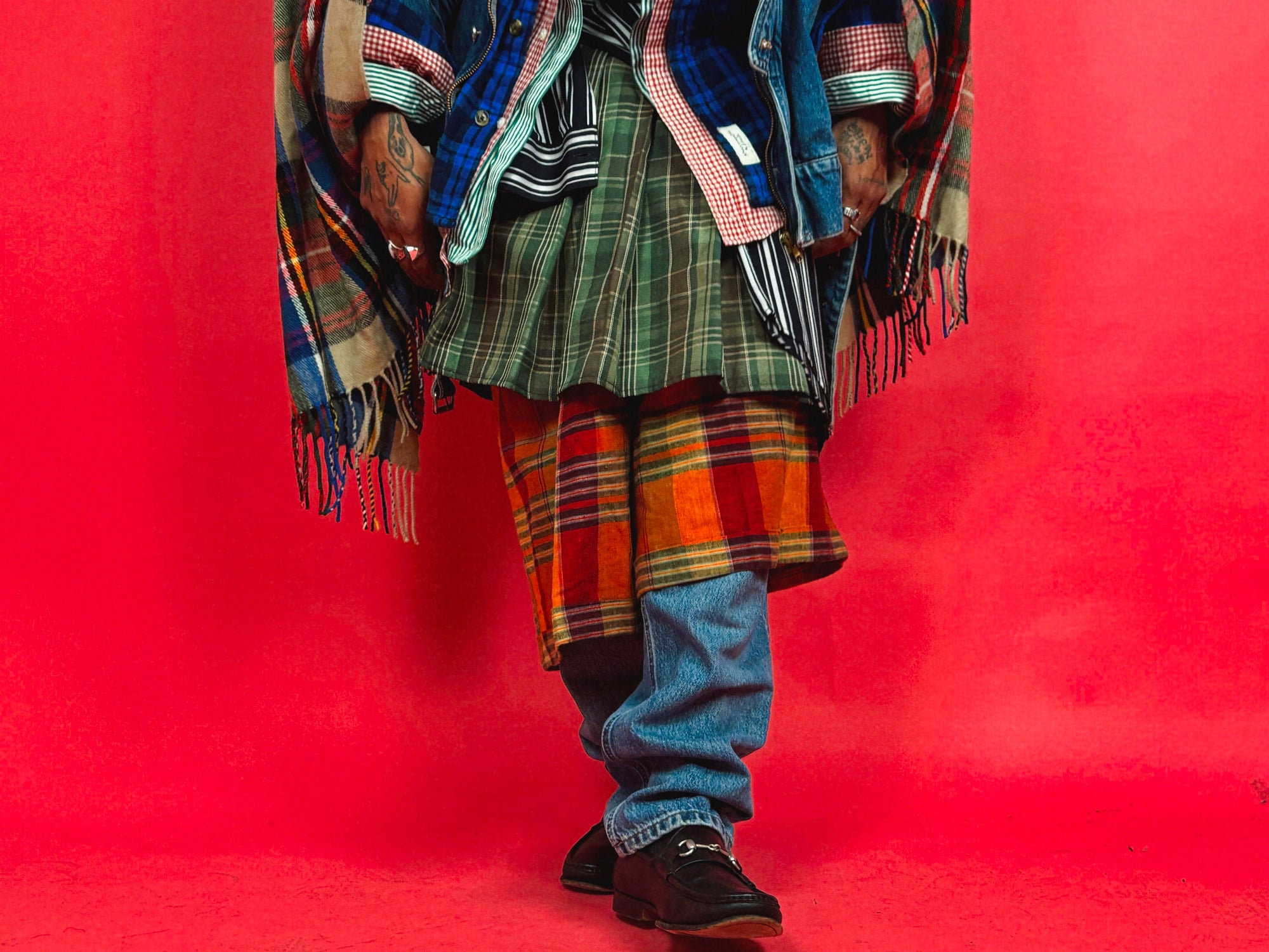 cropped editorial shot of model in layered winter outfit